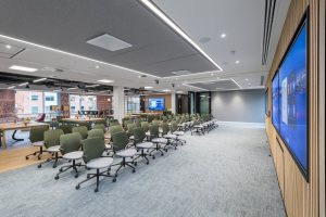 Modern AV-equipped town hall meeting setup